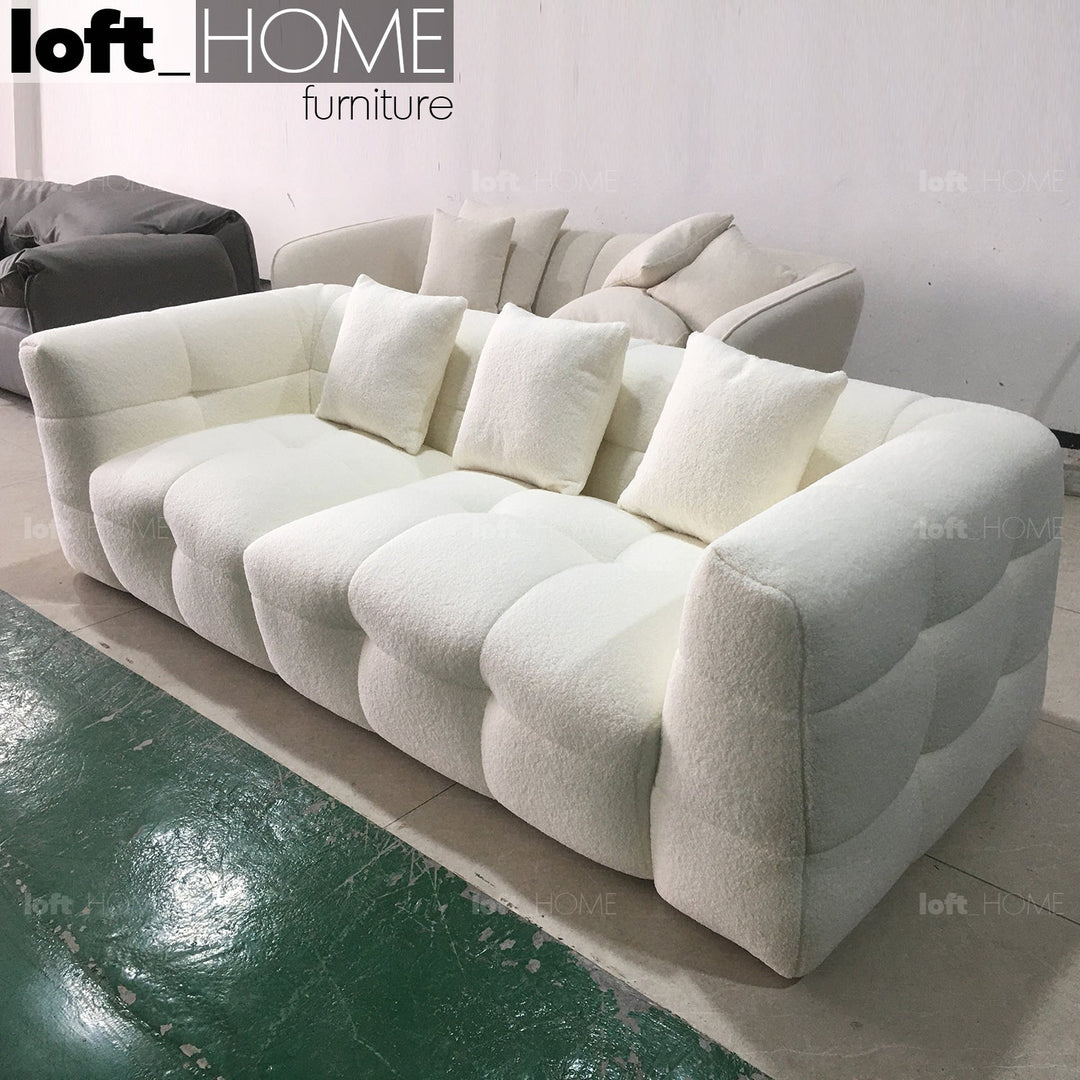 Minimalist boucle fabric 3 seater sofa boba with context.
