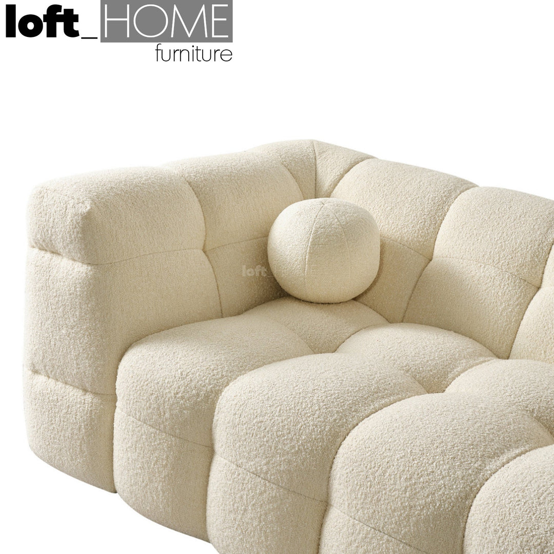 Minimalist boucle fabric 3 seater sofa boba in still life.