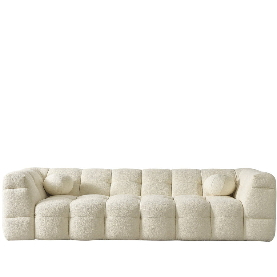 Minimalist boucle fabric 4 seater sofa boba in white background.