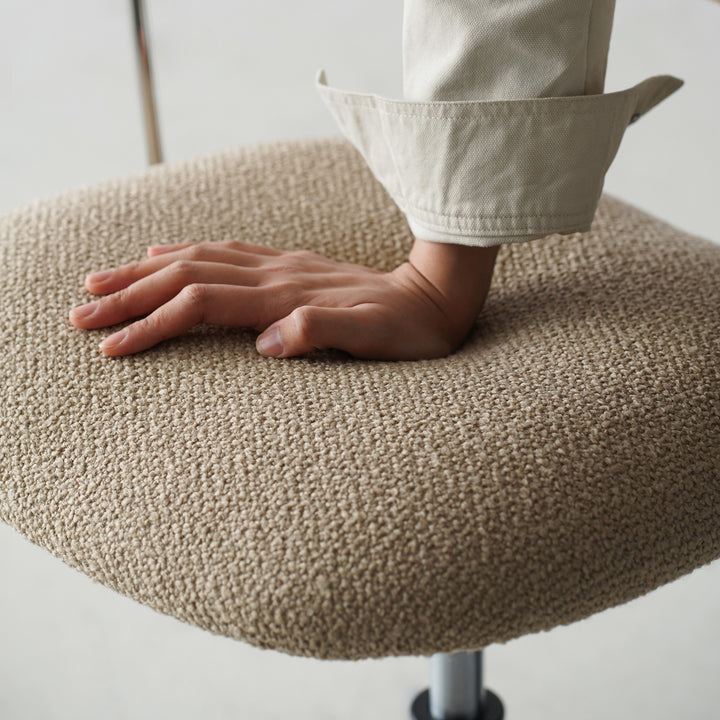 Minimalist boucle fabric study chair aodo with context.