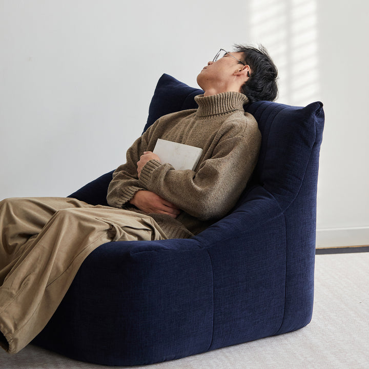 Minimalist chenille velvet fabric 1 seater sofa kait in close up details.