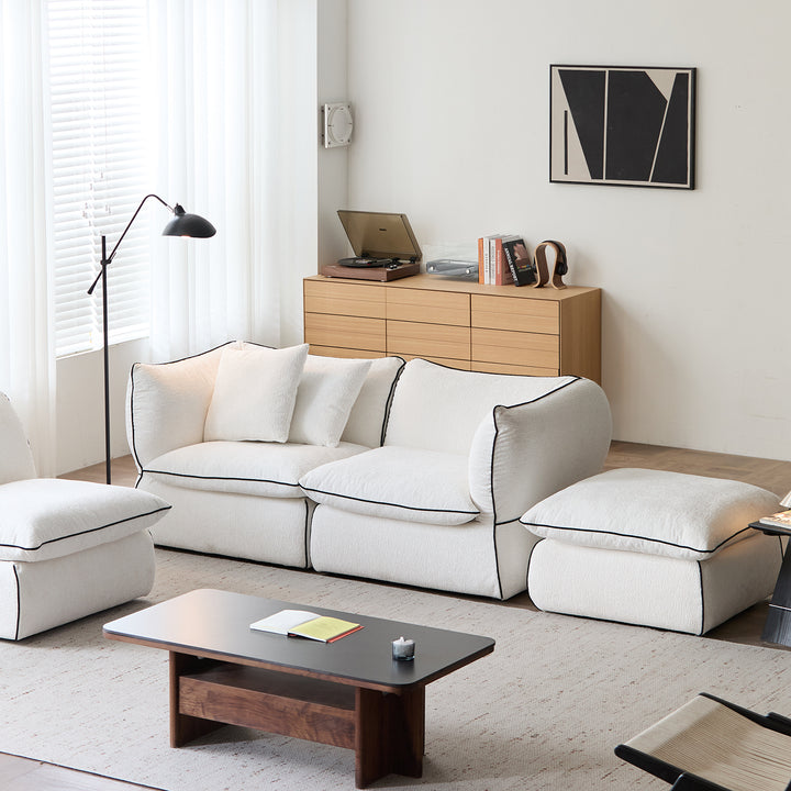 Minimalist chenille velvet fabric 3 seater sofa cloud in close up details.