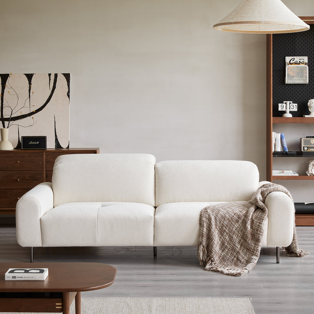 Minimalist chenille velvet fabric 4 seater sofa drift with context.