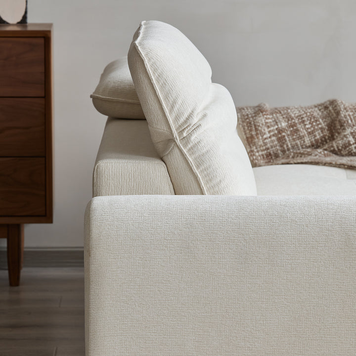 Minimalist chenille velvet fabric 4 seater sofa drift in panoramic view.