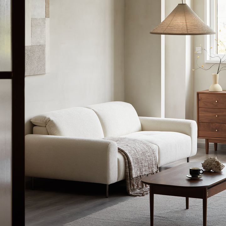 Minimalist chenille velvet fabric 4 seater sofa drift in still life.