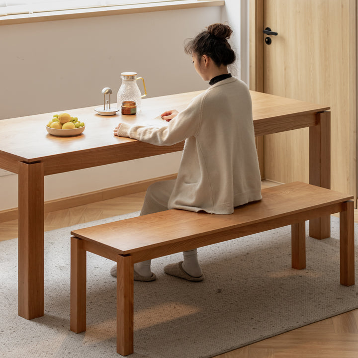 Minimalist cherry wood dining bench coastal color swatches.