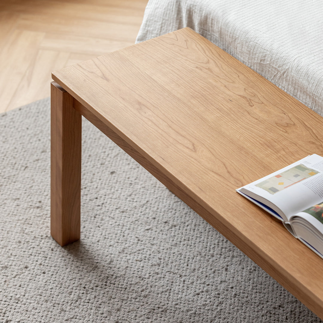 Minimalist cherry wood dining bench coastal with context.