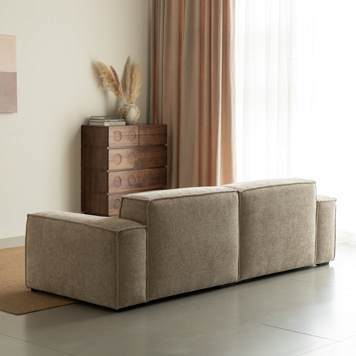 Minimalist linen fabric 3 seater sofa camaleonda in still life.