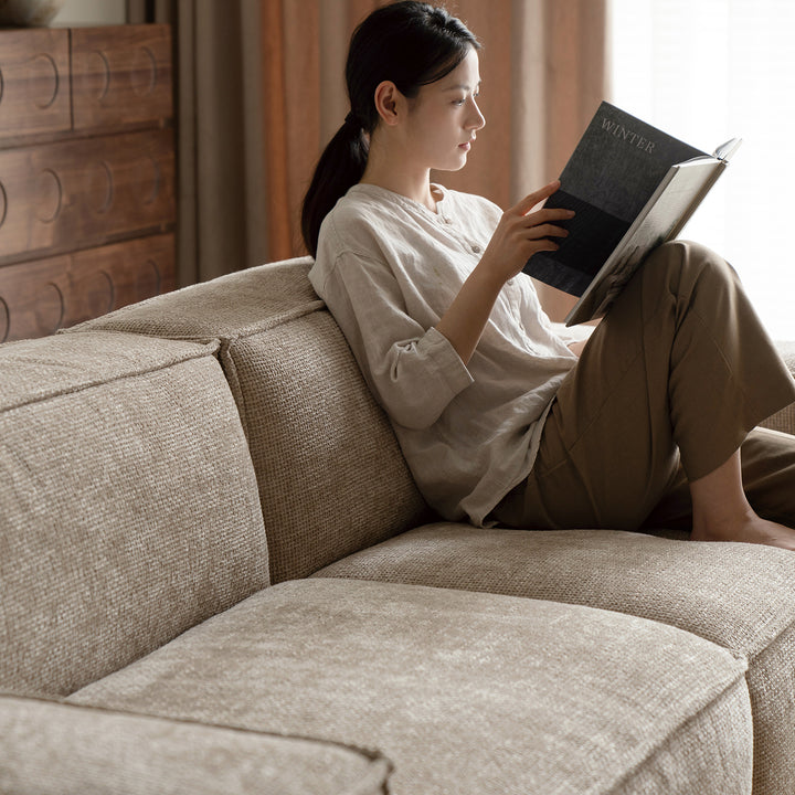 Minimalist linen fabric 3 seater sofa camaleonda with context.