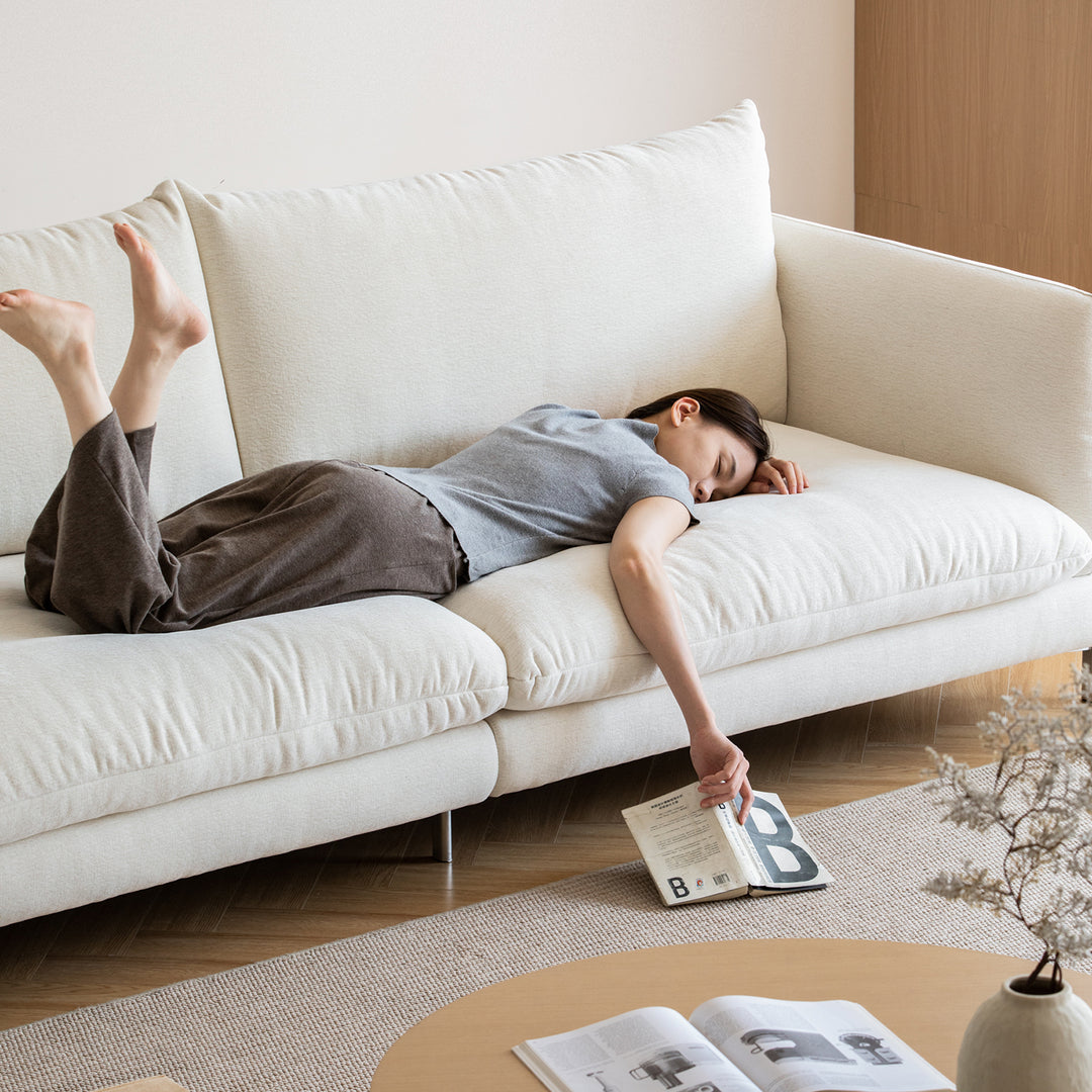 Minimalist cotton fabric 3 seater sofa como in close up details.