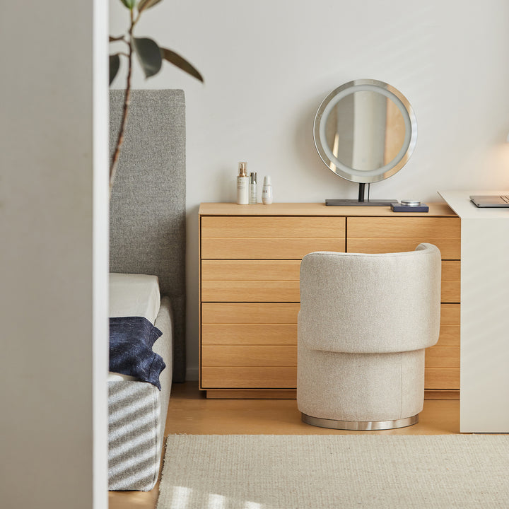 Minimalist cotton fabric dressing chair noel in close up details.