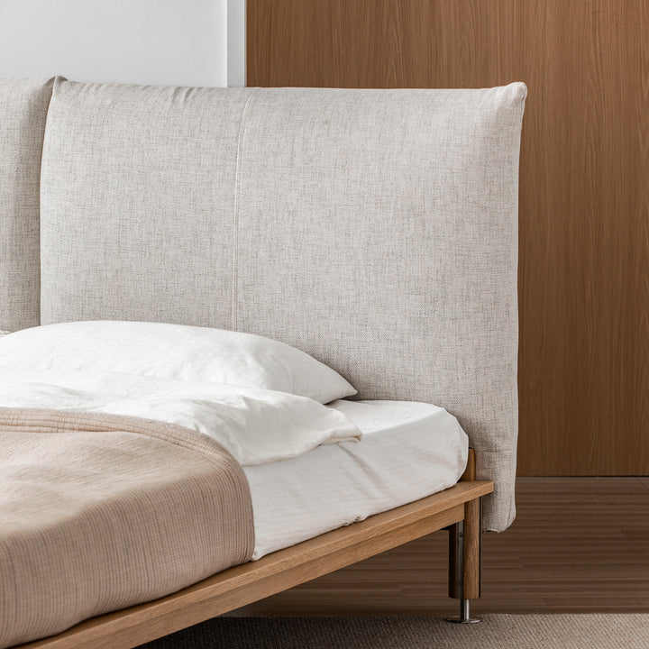 Minimalist cotton fabric oak wood bed evia in close up details.