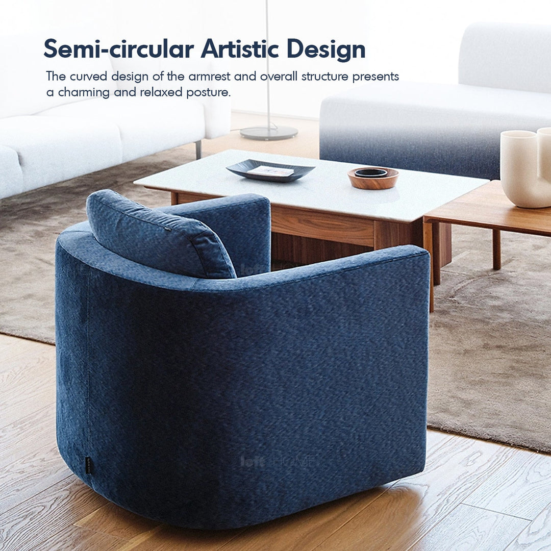 Minimalist fabric 1 seater revolving sofa variegated in panoramic view.