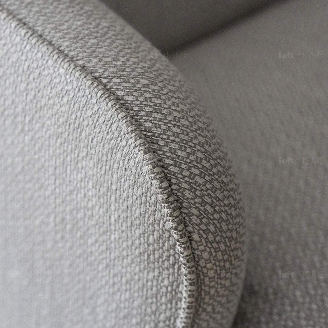 Minimalist fabric 1 seater sofa rina in still life.