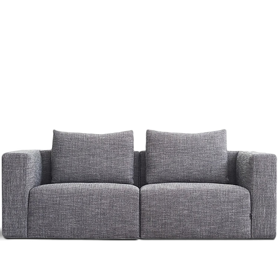 Minimalist fabric 2 seater sofa bri in white background.