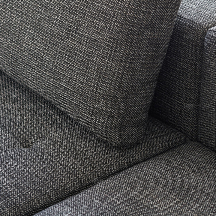 Minimalist fabric 2 seater sofa bri in still life.