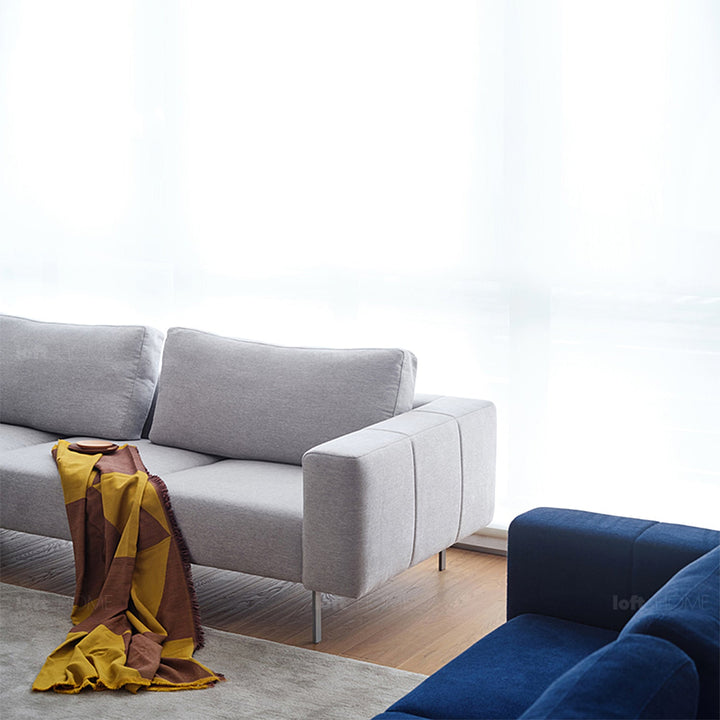 Minimalist fabric 3 seater sofa amalf in panoramic view.