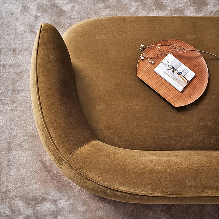Minimalist fabric 3 seater sofa heb in still life.