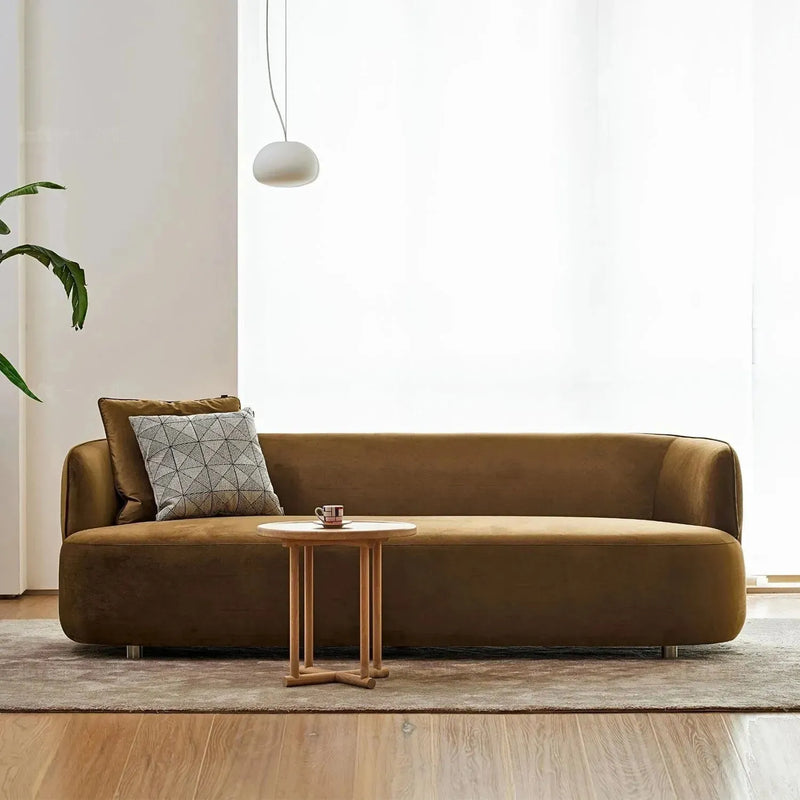 Minimalist fabric 3 seater sofa heb with context.