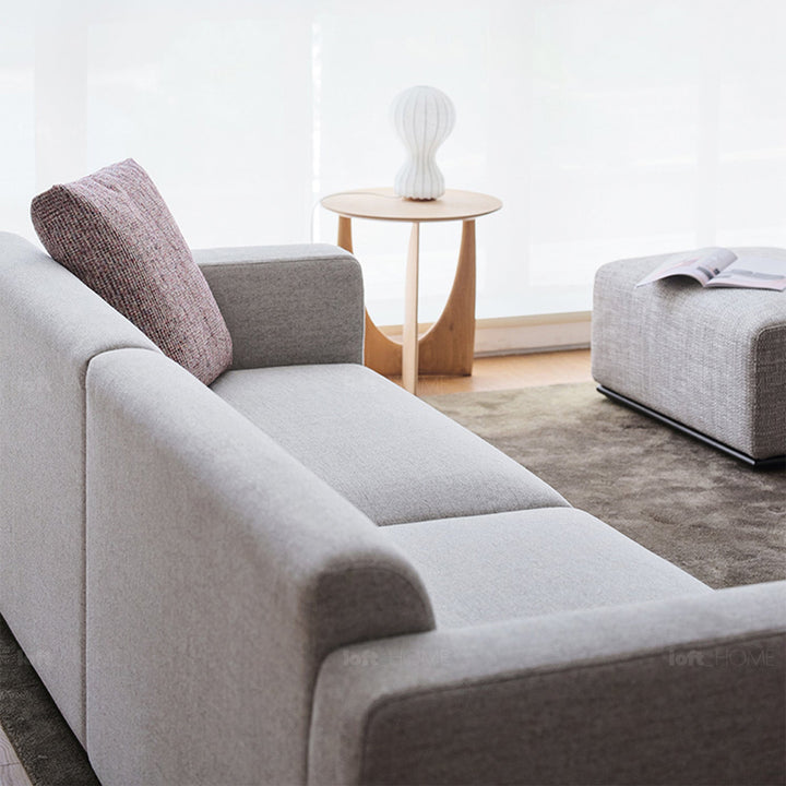 Minimalist fabric 3 seater sofa nemo in close up details.