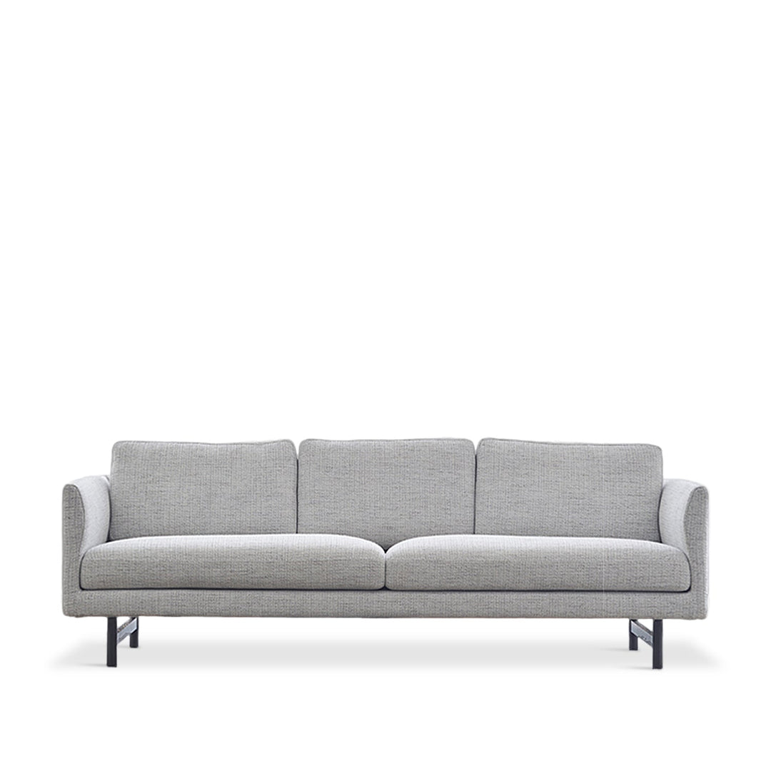 Minimalist fabric 3 seater sofa nor in white background.