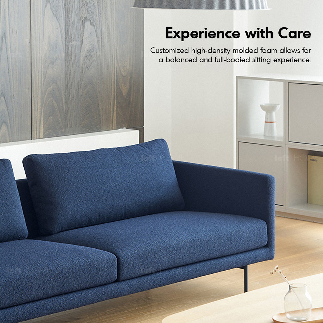 Minimalist fabric 3 seater sofa rina in still life.