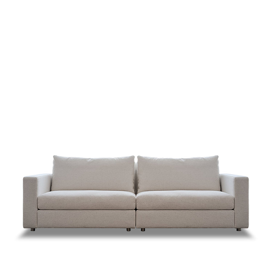 Minimalist fabric 3 seater sofa white in white background.