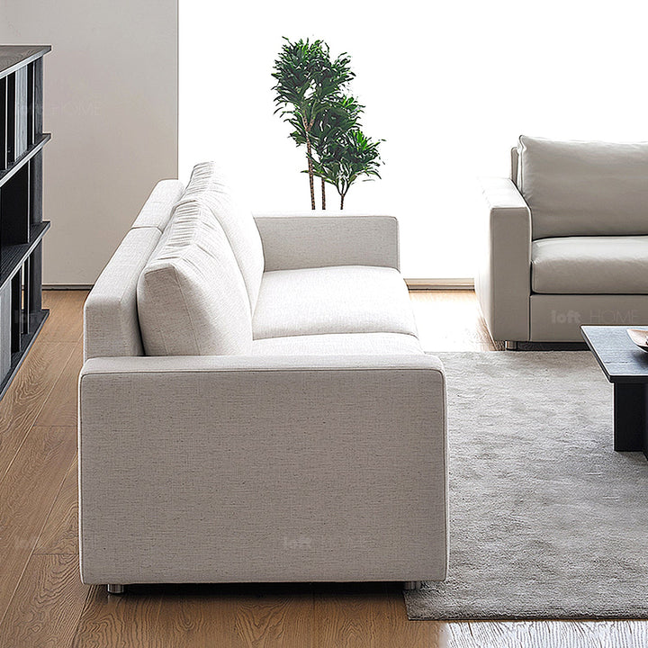 Minimalist fabric 3 seater sofa white in details.