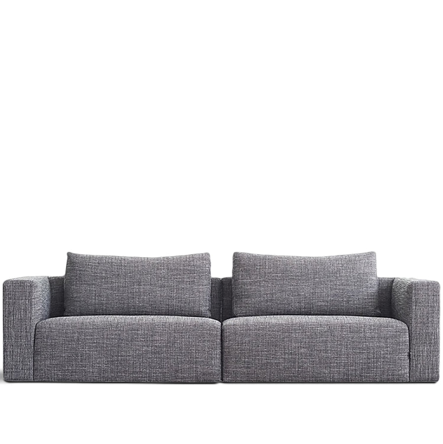 Minimalist fabric 3.5 seater sofa bri in white background.