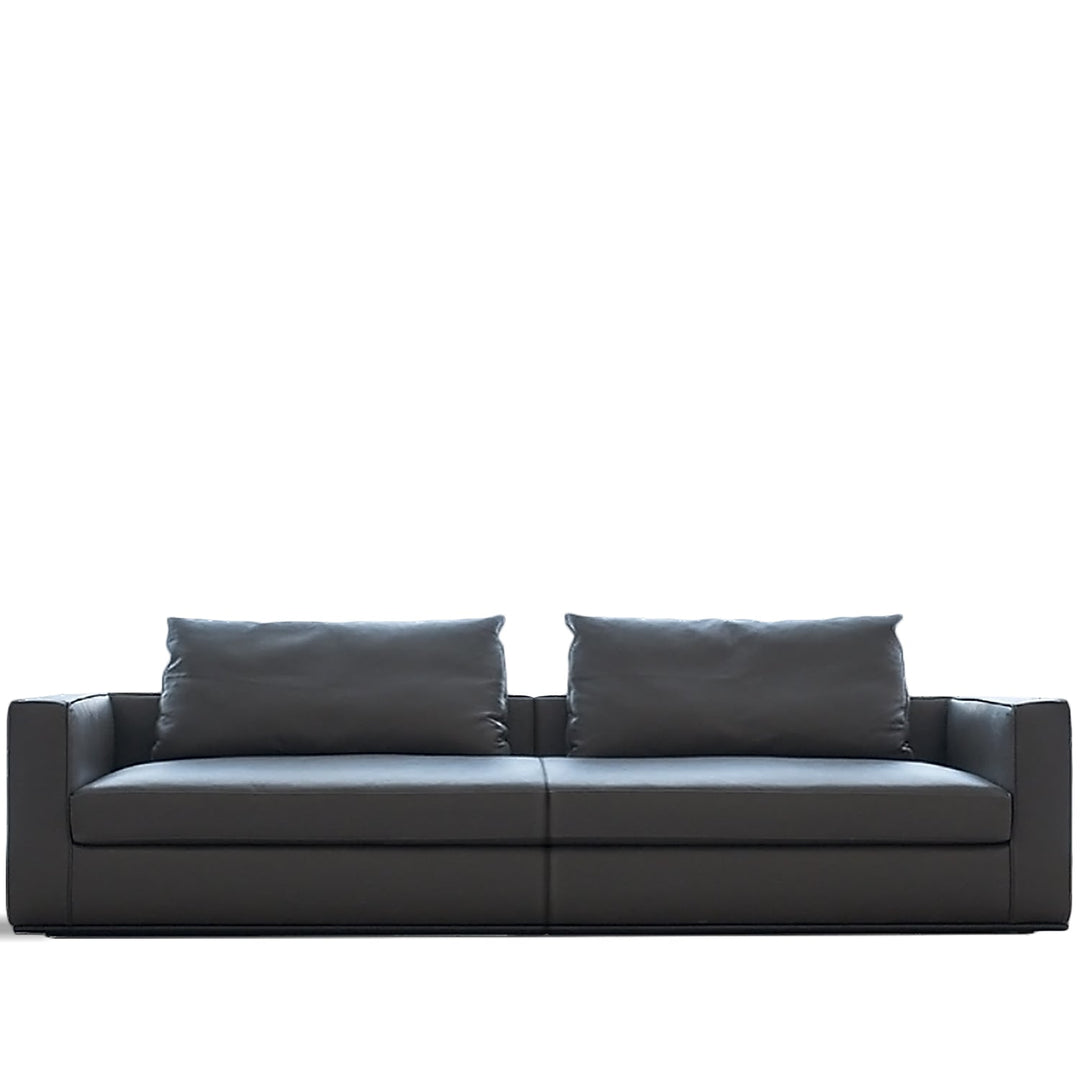 Minimalist fabric 3.5 seater sofa como in white background.