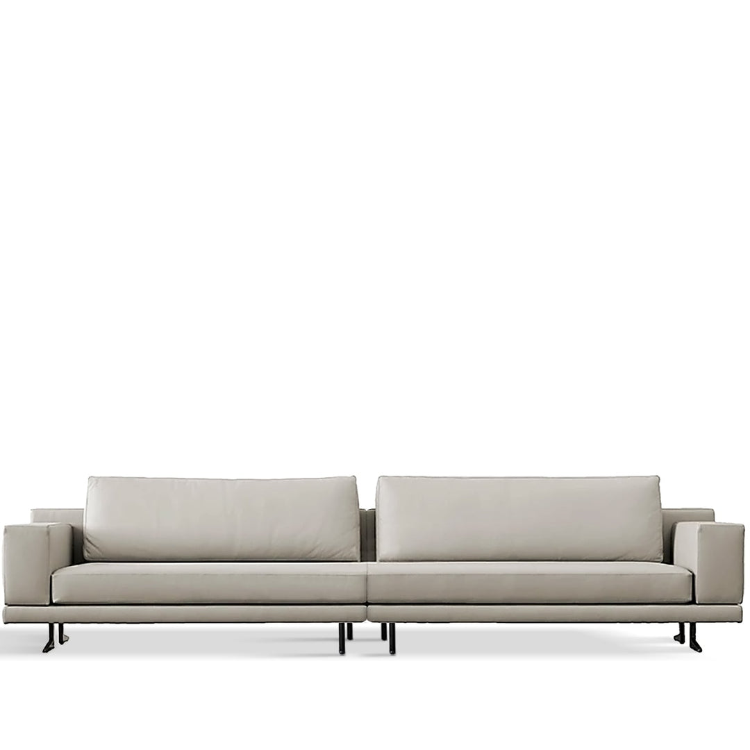 Minimalist fabric 4 seater sofa bologna in white background.