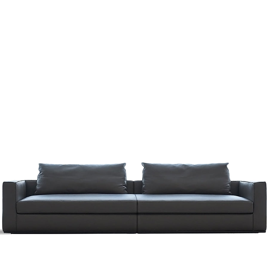 Minimalist fabric 4 seater sofa como in white background.