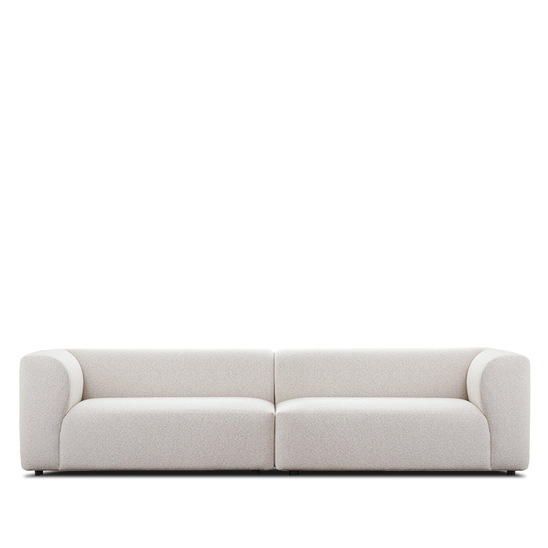 Minimalist fabric 4 seater sofa flower in white background.