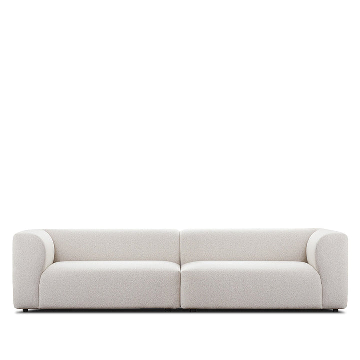 Minimalist fabric 4 seater sofa flower in white background.