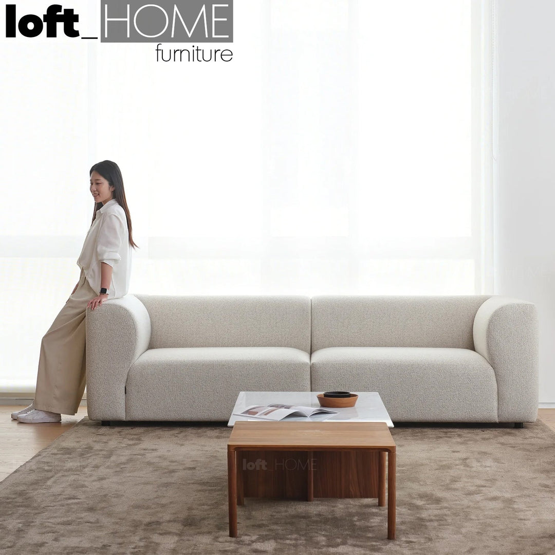 Minimalist fabric 4 seater sofa flower primary product view.