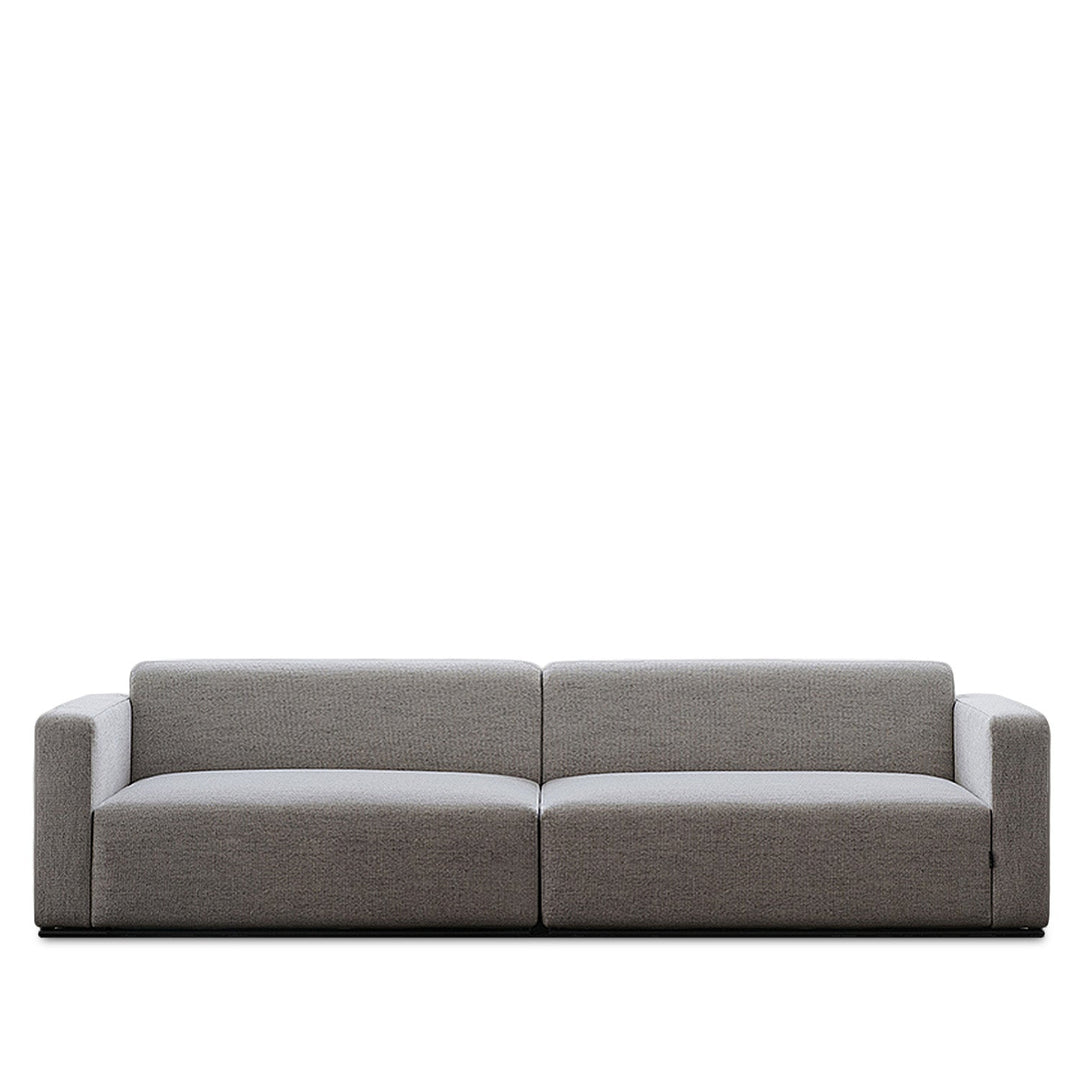 Minimalist fabric 4 seater sofa nemo in white background.