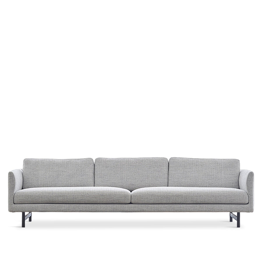 Minimalist fabric 4 seater sofa nor in white background.