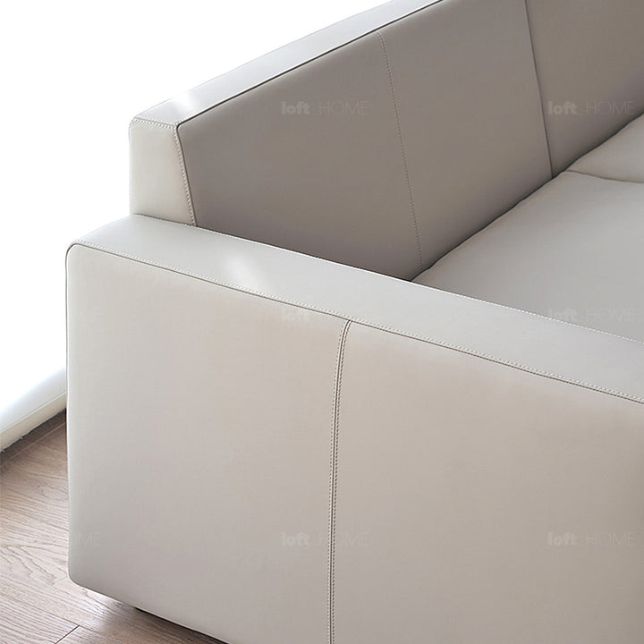 Minimalist fabric 4 seater sofa white in still life.
