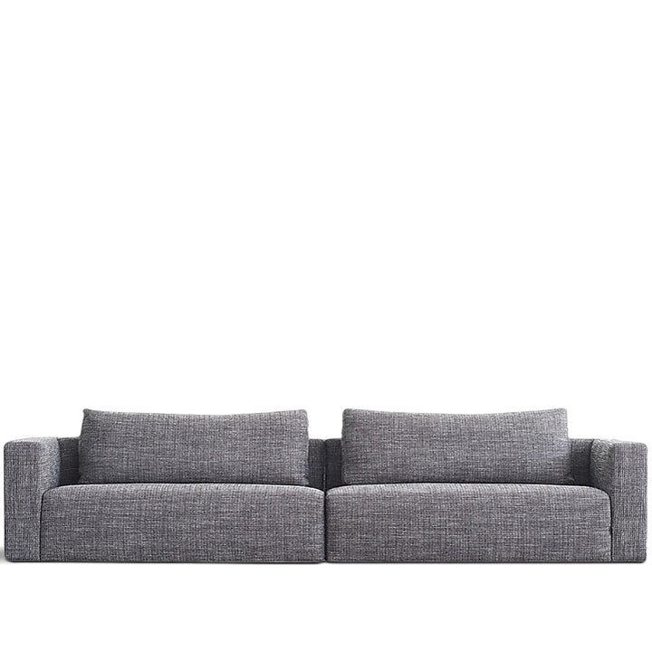 Minimalist fabric 4.5 seater sofa bri in white background.