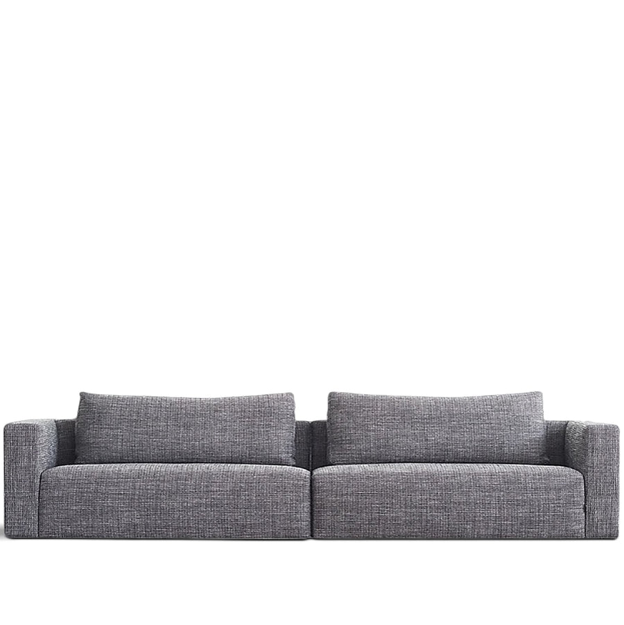 Minimalist fabric 4.5 seater sofa bri in white background.