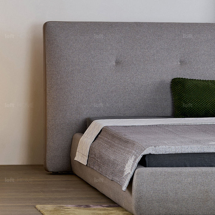 Minimalist fabric bed charles layered structure.