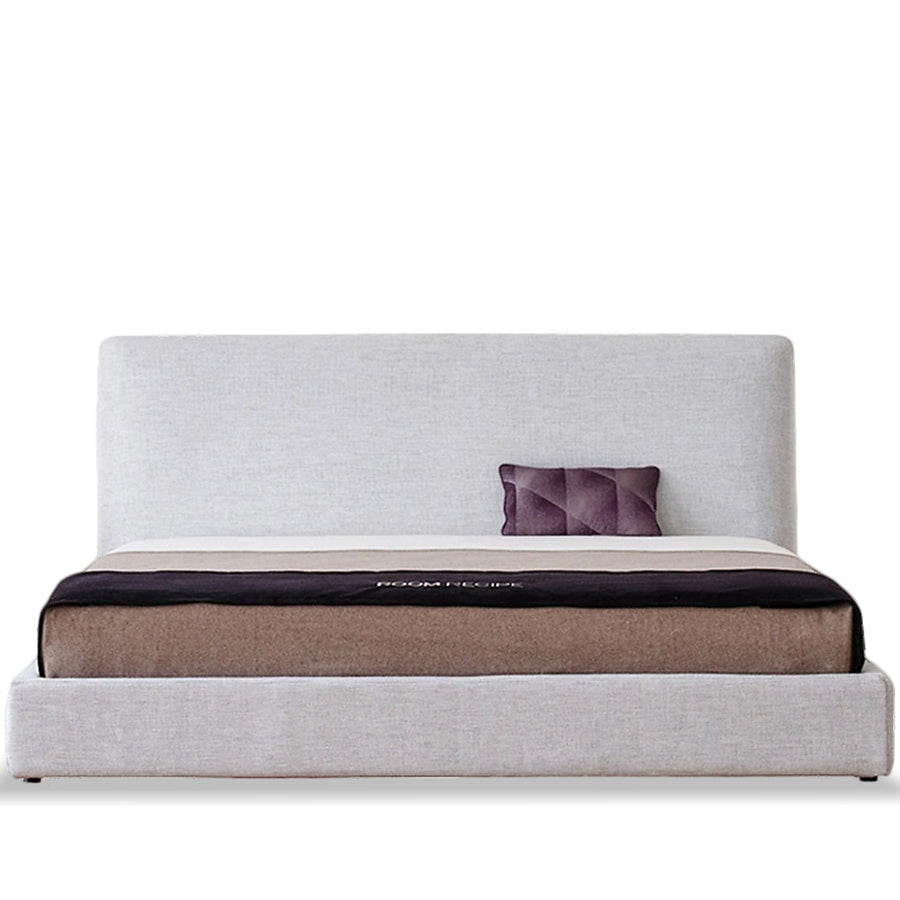 Minimalist fabric bed lines in white background.
