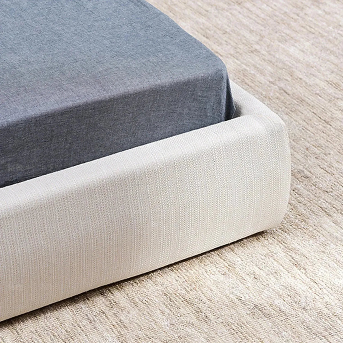Minimalist fabric bed sino in still life.