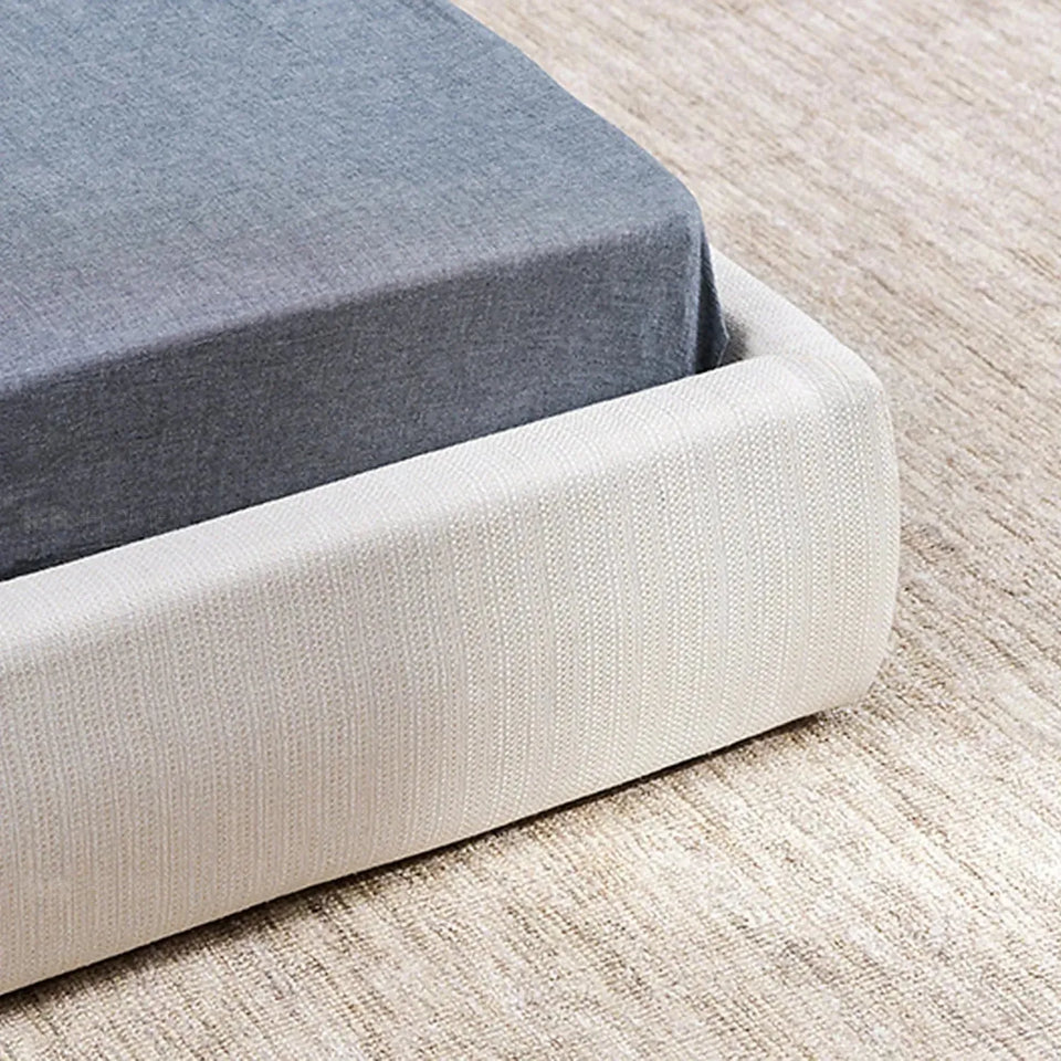 Minimalist fabric bed sino in still life.