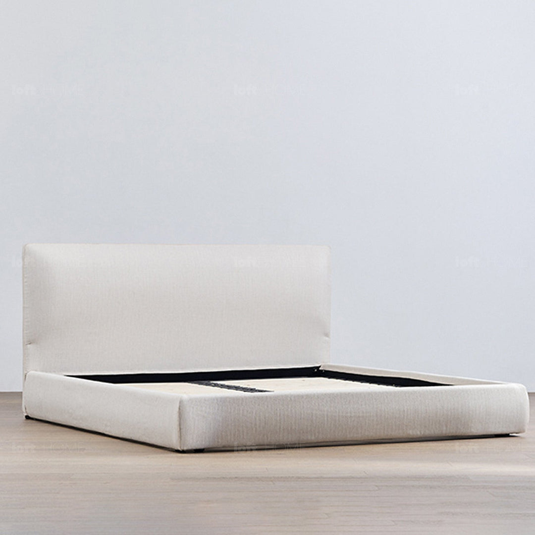 Minimalist fabric bed sino in panoramic view.