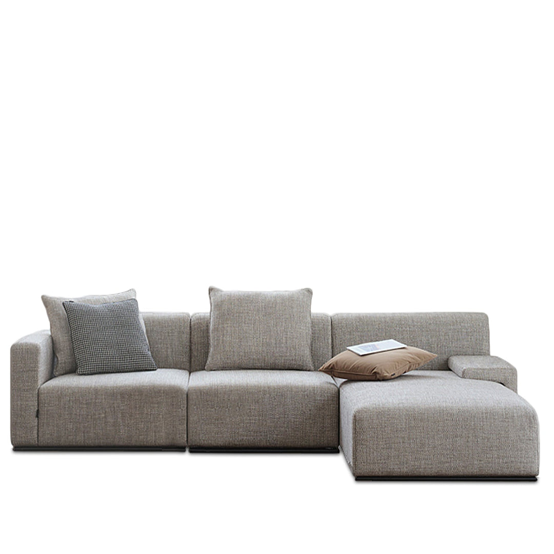 Minimalist fabric l shape sectional sofa nemo 2+l in white background.