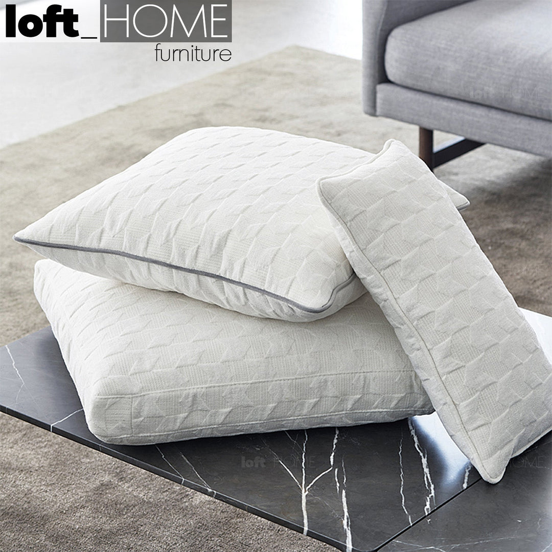 Minimalist fabric sofa pillow angle white primary product view.