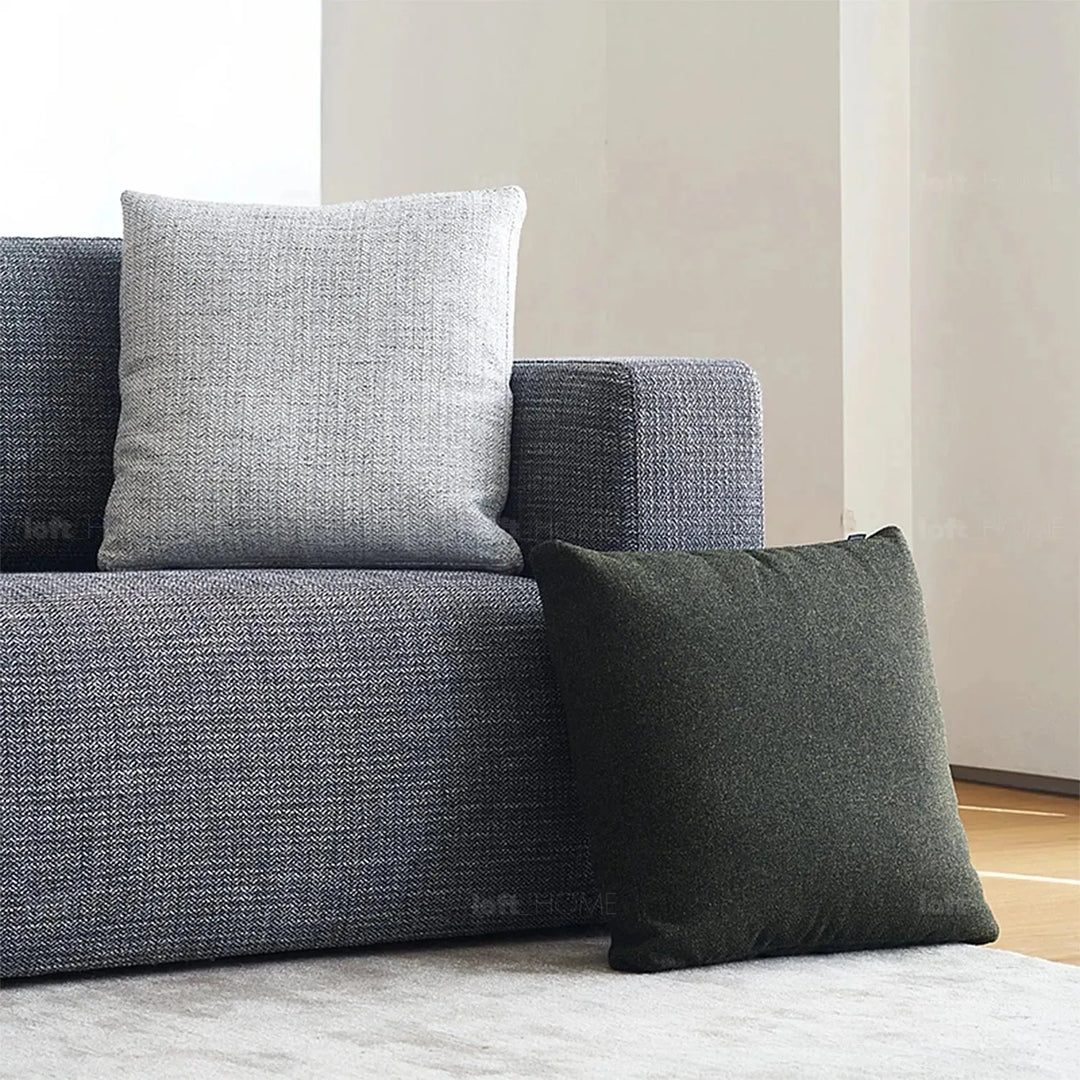 Minimalist fabric sofa pillow nor green color swatches.