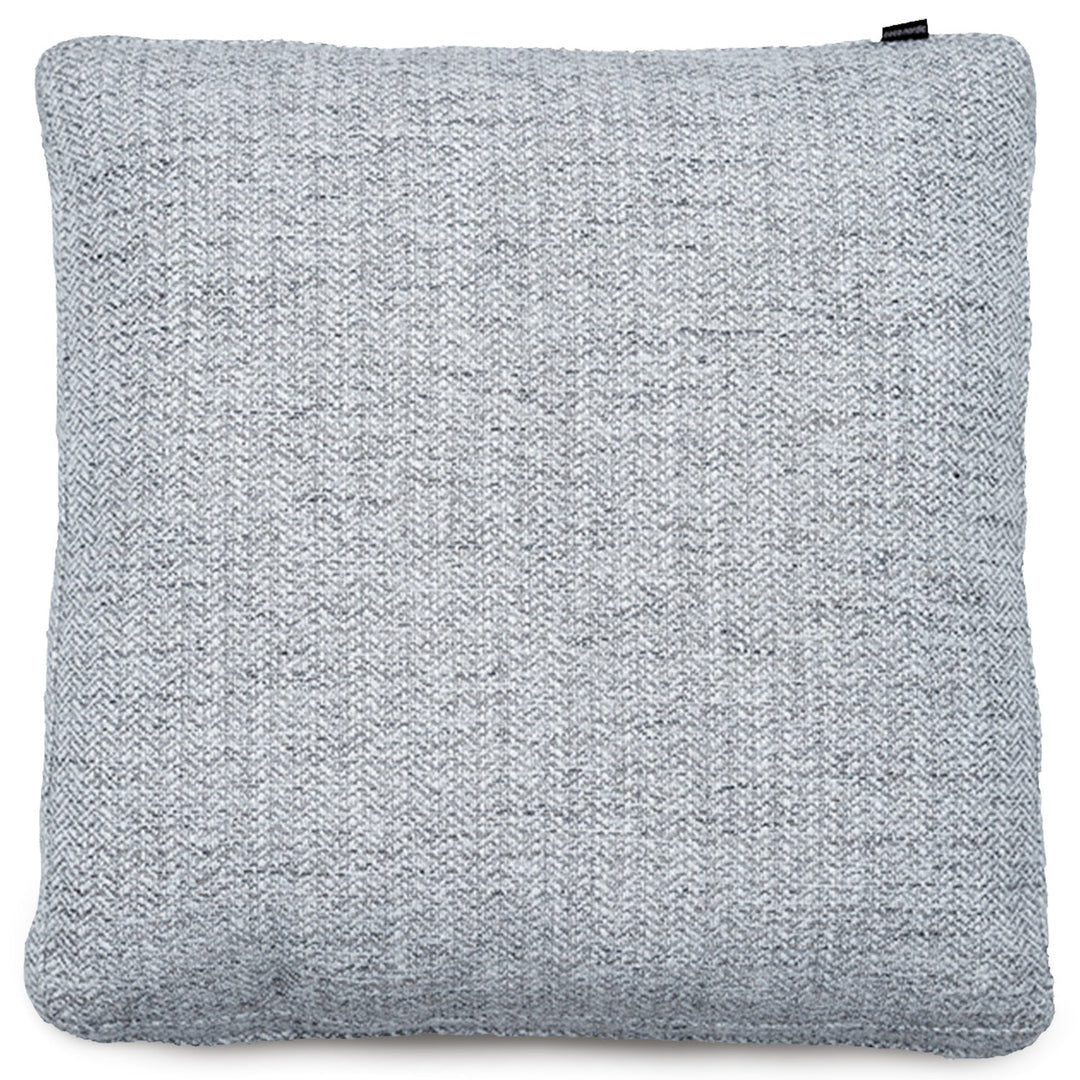 Minimalist fabric sofa pillow nor white in white background.