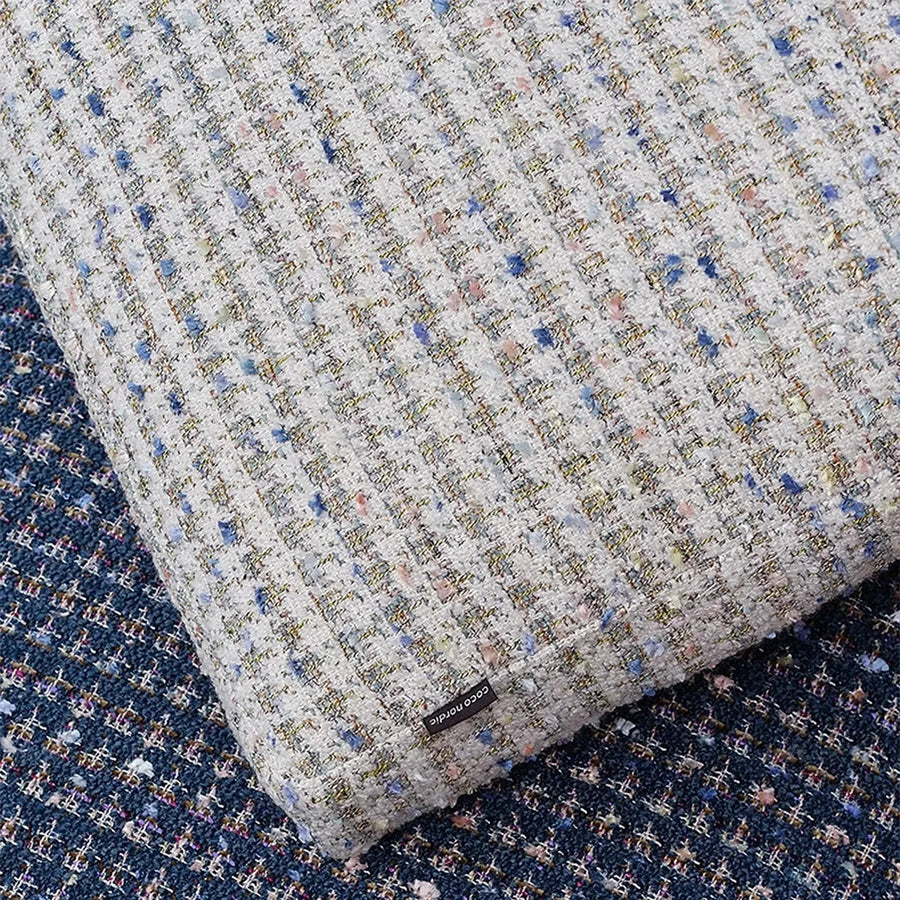 Scandinavian fabric sofa pillow pearl white color swatches.